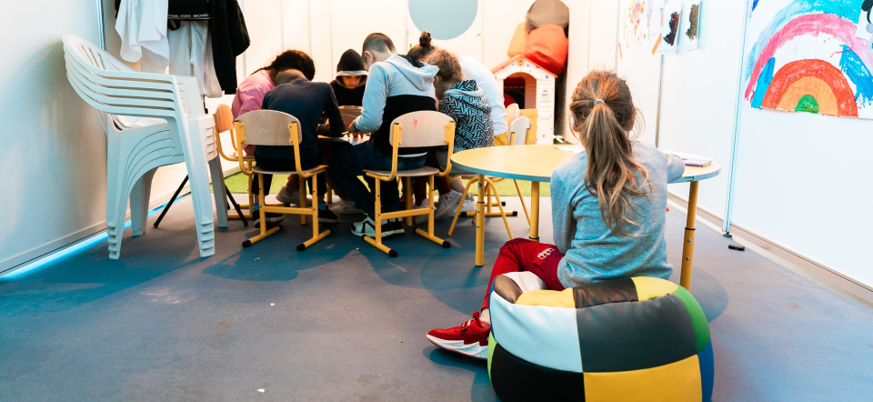 Children drawing at the registration office of the United Nations High Commissioner for Refugees (UNHCR) in Chisinau, Moldova. The UNHCR is a humanitarian aid partner of the European Union.